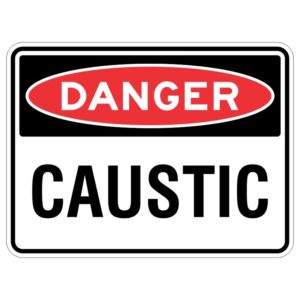Imagine a sign that will tell you when something is really dangerous. This sign is like a superhero, ready to protect you from something called caustic aluminum. It's like a warning signal that will keep you safe from harm.