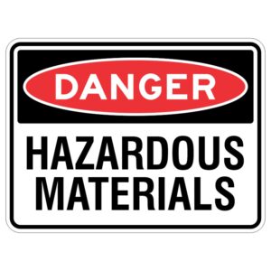 Imagine a shiny sign made out of a special material that protects it from the sun's rays. It has a bright red warning that says DANGER - Hazardous Materials, which means you should stay away because it can be very dangerous.