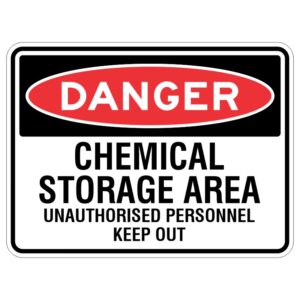 Imagine a shiny metal sign with special protection for the writing that says "DANGER - Chemical Storage Area." This sign is very important because it tells people that only certain grown-ups are allowed to go there.
