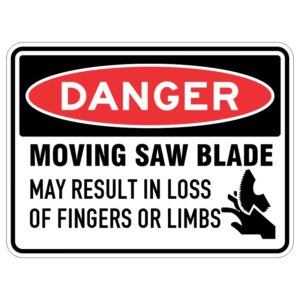 Imagine a shiny metal sign that has been specially protected from the sun's rays. It has a very important message written on it in big letters that say "WARNING - A spinning saw blade could hurt your fingers or arms!"