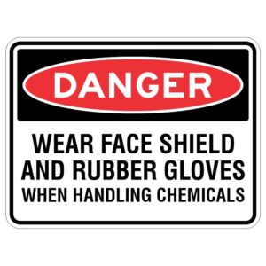 This sign says "Be careful! Put on a face shield and rubber gloves when touching chemicals."