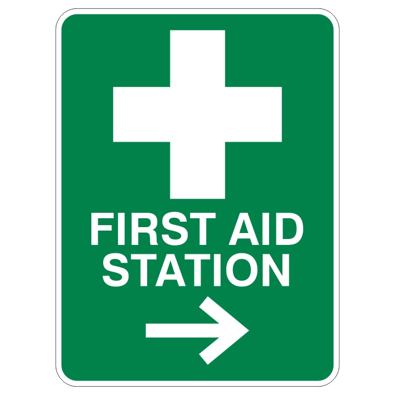 A green sign with a white cross above the words FIRST AID STATION and an arrow pointing to the right.