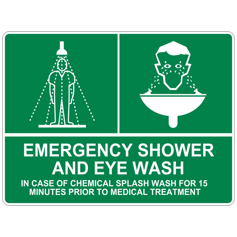 A safety sign indicating an emergency shower and eyewash station, featuring a graphic of a person under a shower on the left and a person using an eyewash station on the right. The text at the bottom reads EMERGENCY SHOWER AND EYE WASH IN CASE OF CHEMICAL SPLASH WASH FOR 15 MINUTES PRIOR TO MEDICAL TREATMENT.