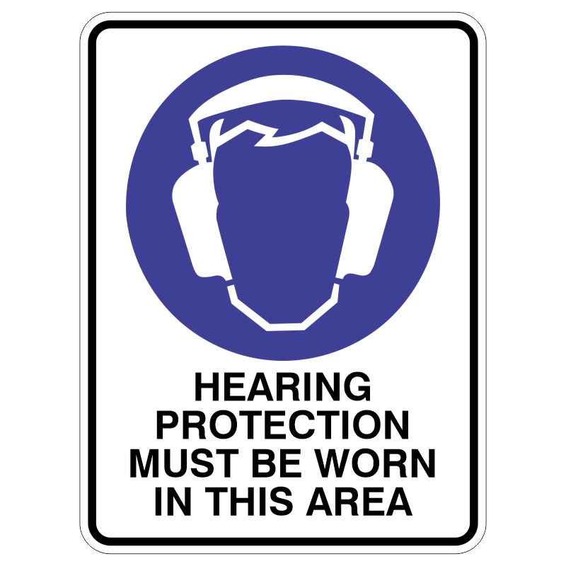 A safety sign featuring a head silhouette wearing earmuffs against a blue background, with the text stating HEARING PROTECTION MUST BE WORN IN THIS AREA below it.