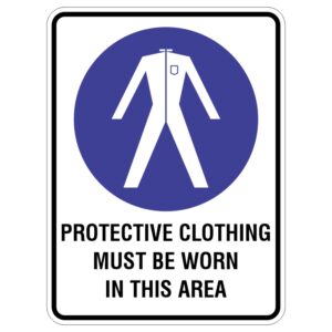 A sign with a blue circle featuring a white figure in a jumpsuit, indicating that protective clothing must be worn in this area, accompanied by the text PROTECTIVE CLOTHING MUST BE WORN IN THIS AREA.