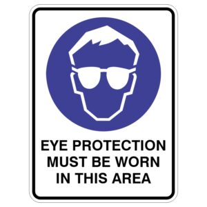 A safety sign depicting a stylized face with glasses in a blue circle, accompanied by the text EYE PROTECTION MUST BE WORN IN THIS AREA underneath.