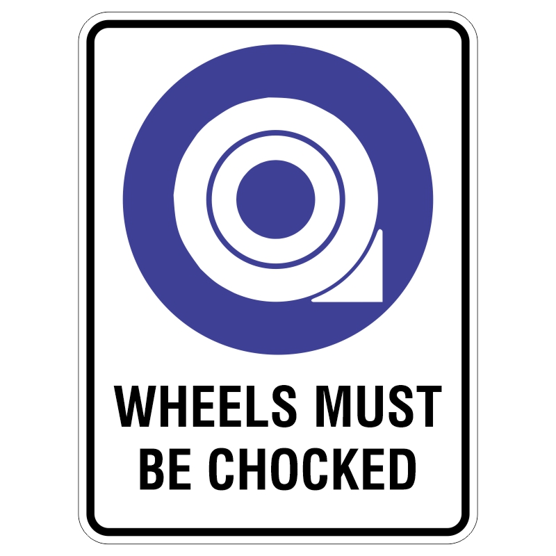 A safety sign with a purple circular graphic depicting a wheel with a chock, and the text WHEELS MUST BE CHOCKED in bold black letters below.