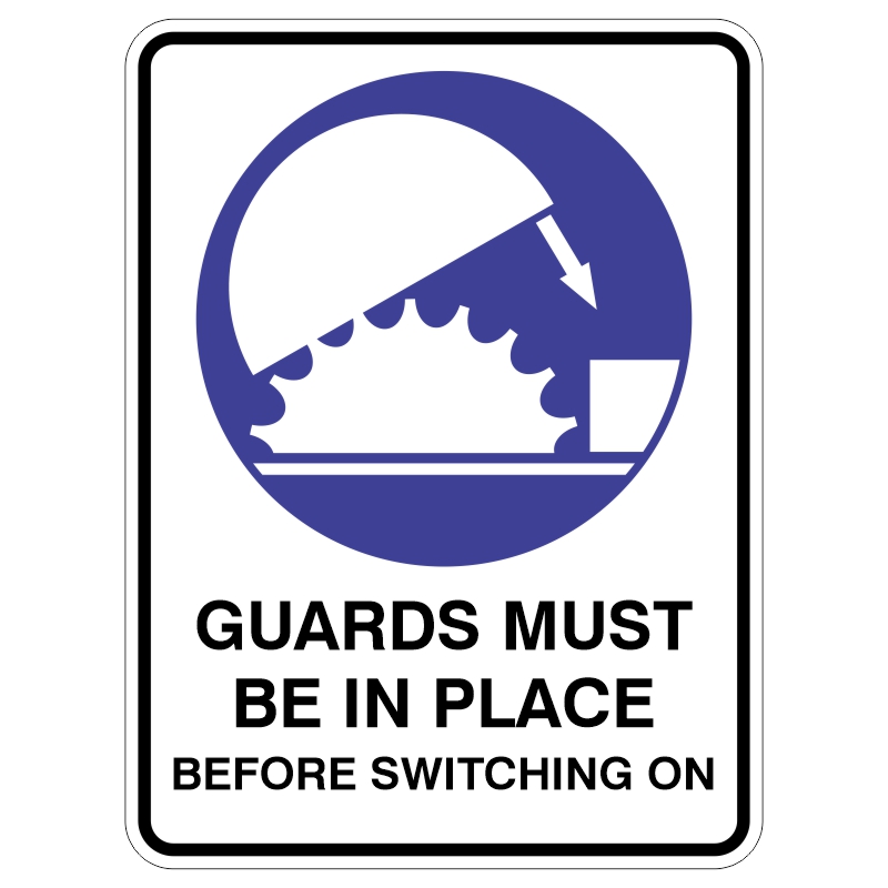 Safety sign indicating that guards must be in place before switching on equipment, featuring a graphical illustration of a guard covering a rotating blade.