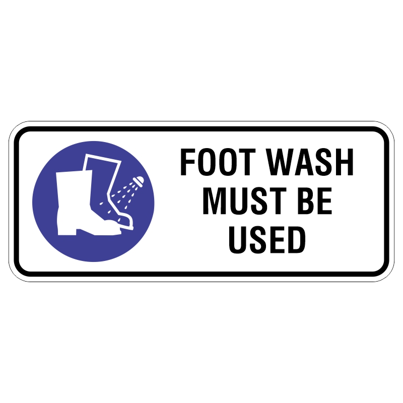 Sign with a blue circle and white illustration of a boot being sprayed with water, accompanied by the text FOOT WASH MUST BE USED.