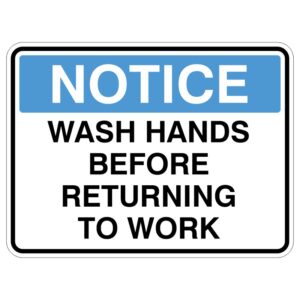 A notice sign with a blue header that reads NOTICE and black text stating WASH HANDS BEFORE RETURNING TO WORK.