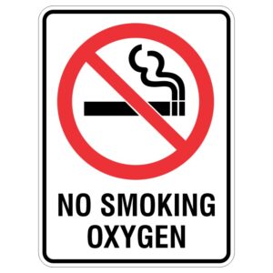 A sign displaying a red circle with a diagonal line over a cigarette icon, accompanied by the text NO SMOKING OXYGEN in bold black letters at the bottom, indicating a prohibition against smoking in an oxygen-rich environment.