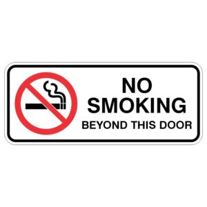 A sign with a red circle and diagonal line over a cigarette symbol, indicating NO SMOKING BEYOND THIS DOOR in bold black letters on a white background.