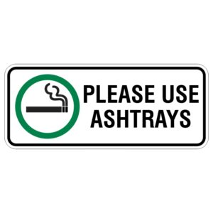 A rectangular sign featuring a green circle with a cigarette symbol and the text PLEASE USE ASHTRAYS in bold black letters.