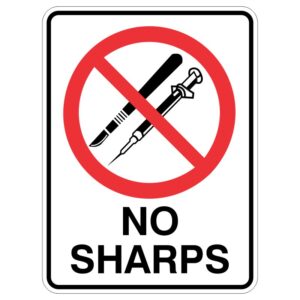 A safety sign with a red circle and diagonal line across a scalpel and a syringe, indicating 'No Sharps'.
