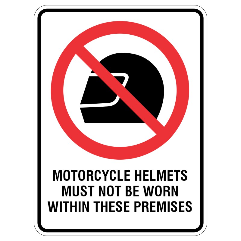 A sign with a red circle and diagonal line over a black motorcycle helmet, stating MOTORCYCLE HELMETS MUST NOT BE WORN WITHIN THESE PREMISES in bold black text.