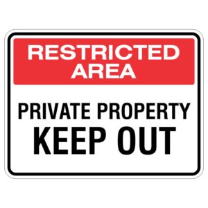 A sign indicating a restricted area with the text 'PRIVATE PROPERTY KEEP OUT' prominently displayed.