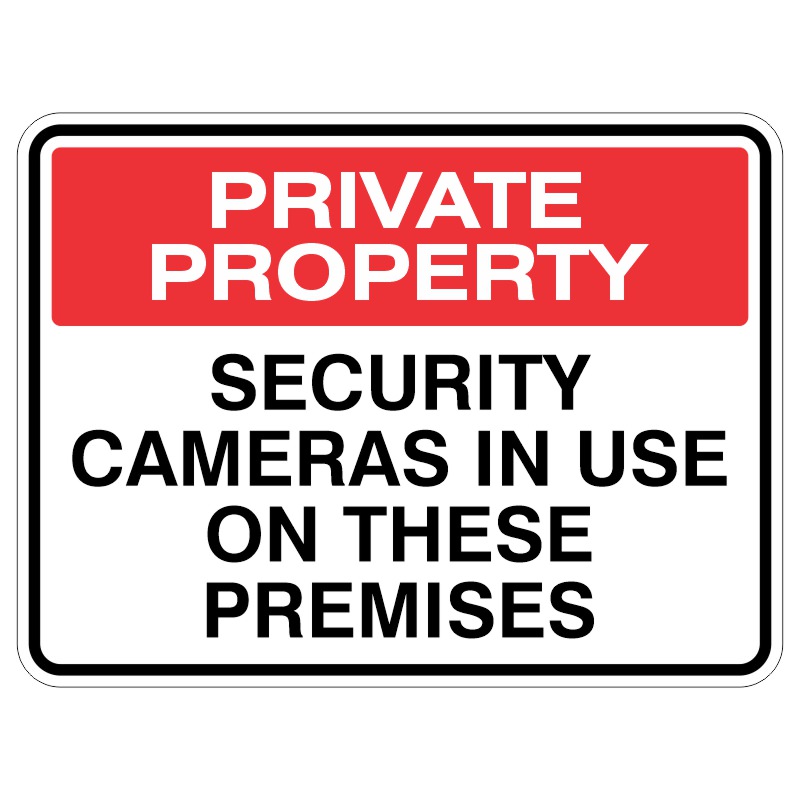A sign indicating private property, stating that security cameras are in use on the premises, featuring a red background with white text.