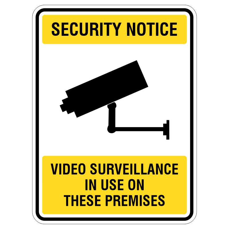 A security notice sign featuring a silhouette of a surveillance camera, with the text 'SECURITY NOTICE' at the top and 'VIDEO SURVEILLANCE IN USE ON THESE PREMISES' at the bottom, all enclosed in a yellow and black border.