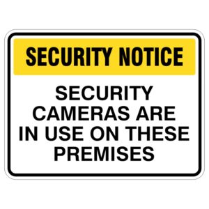 A security notice sign stating 'SECURITY CAMERAS ARE IN USE ON THESE PREMISES' with a yellow header and bold black text on a white background.