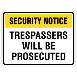 A security notice sign with a yellow header that reads 'SECURITY NOTICE' above the bold black text stating 'TRESPASSERS WILL BE PROSECUTED.'