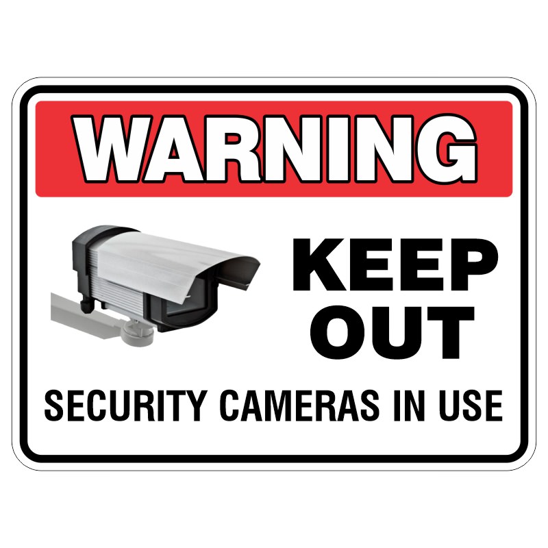 A warning sign indicating 'KEEP OUT' with a graphic of a security camera and the text 'SECURITY CAMERAS IN USE' beneath it, all enclosed in a red and black border.