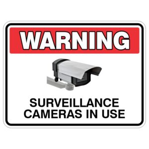 A warning sign indicating that surveillance cameras are in use, featuring a graphic of a security camera and bold text stating 'WARNING' at the top and 'SURVEILLANCE CAMERAS IN USE' below.