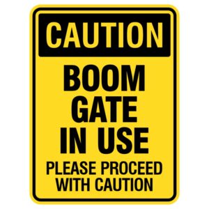 The shiny, durable metal sign reads, "Boom Gate Is Working - Be Careful!" It warns pedestrians and drivers to exercise caution around the moving gate for their safety.